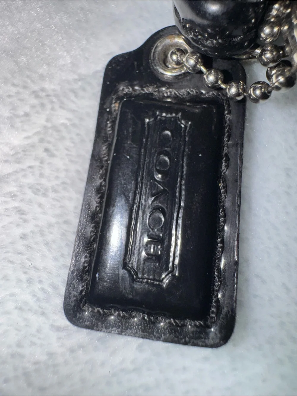 Coach Black Signature Jacquard Wristlet Pouch with Silver Emblem